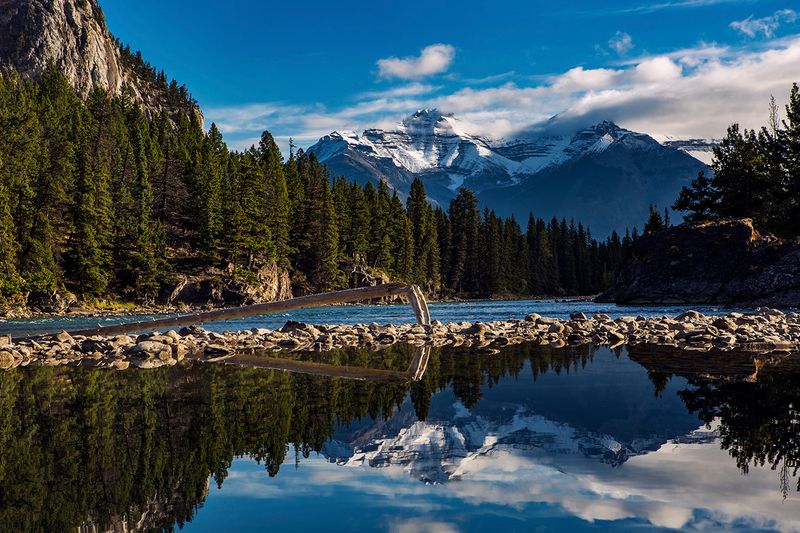 Bow River flows through Banff, offering a stunning backdrop to the surrounding landscape