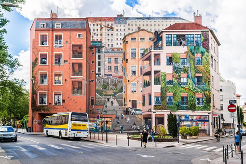 An artistic mural in Lyon boasts stunning art in an unmissable French style.