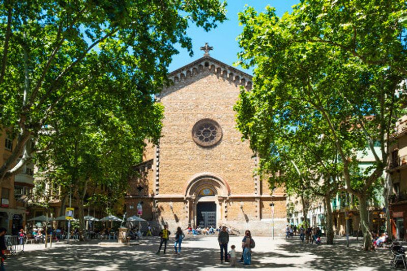 A view over the square Placa de la Virreina at the popular Gracia District in Barcelona, Spain.