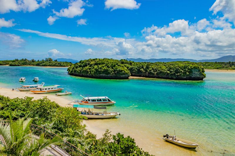 Tourist boats and yachts at Kabira Bay