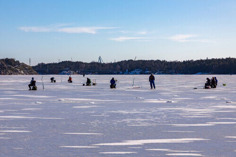 Ice fishing in Naantali, Finland.