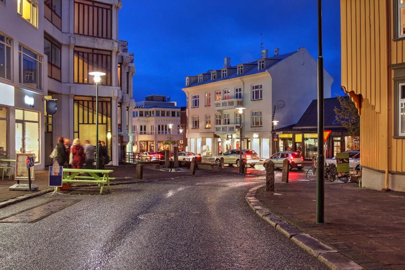 Street scene with people walking at Skolavordustigur in downtown Reykjavik.