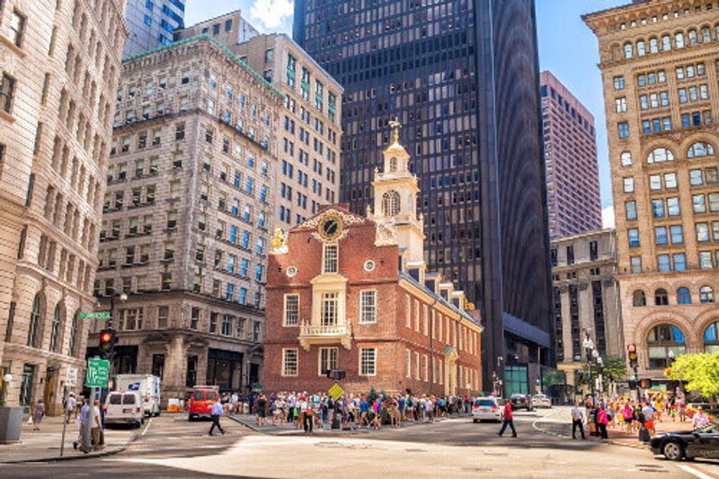 Tourist and locals at the Old State House, a historic building in Boston.