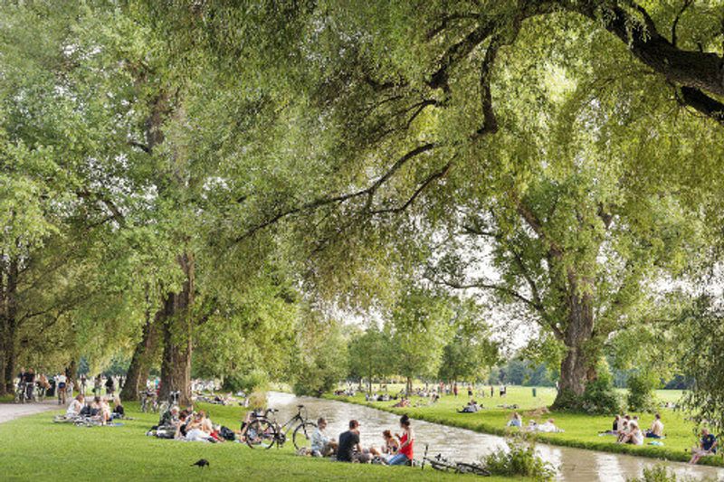 People sunbathing in the English Garden, Munich.