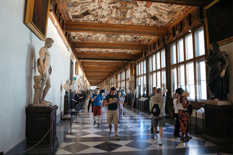 A view of the artwork adorning the inside of the Uffizi Gallery.