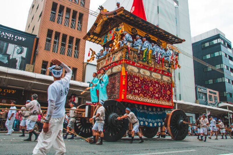 Gion Matsuri Floats are wheeled through the city in Japan's most famous festival during summer in Kyoto, Japan
