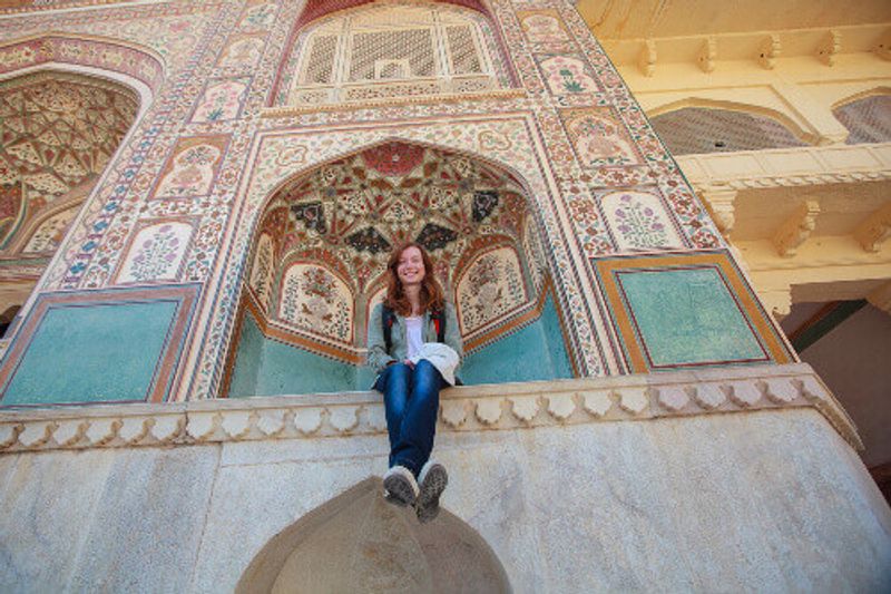 A young tourist enjoys the sights of the historic Naharagarh Fort in Jaipur, India.