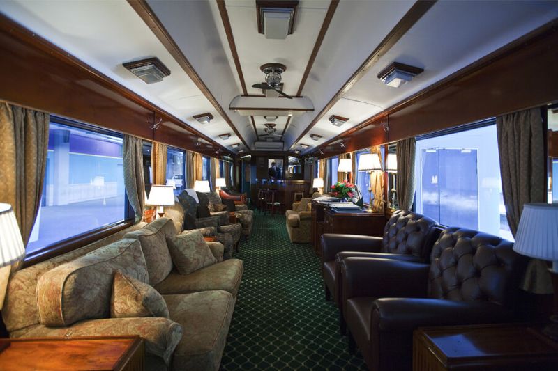 The Rovos Rail Luxury Train features cozy interiors and armchairs.