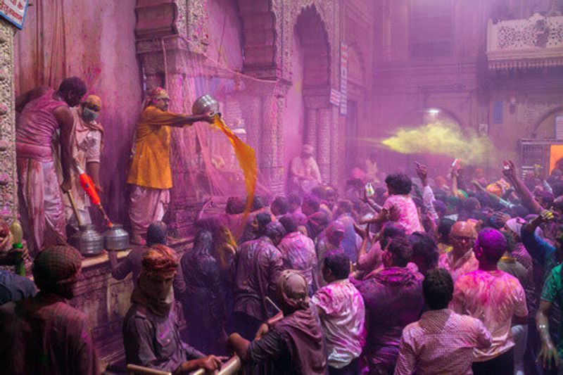 The celebration of Holi at the Hindu Banke Bihare temple in Vrindavan, Uttar Pradesh.