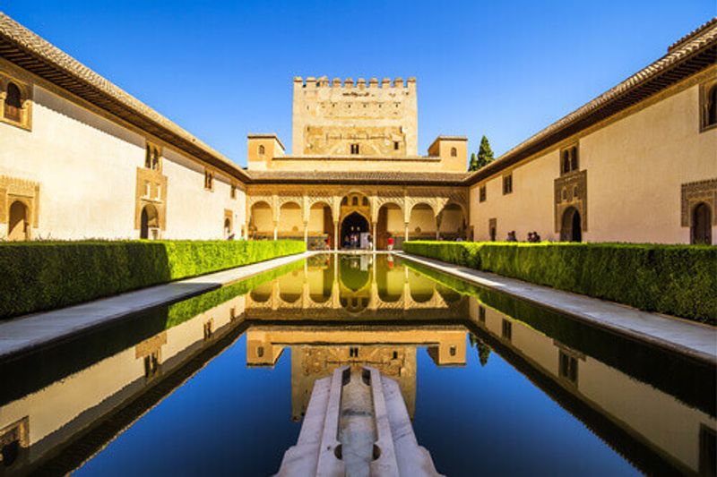 Inside the architectural complex of the Generalife Gardens in Granada, Spain.