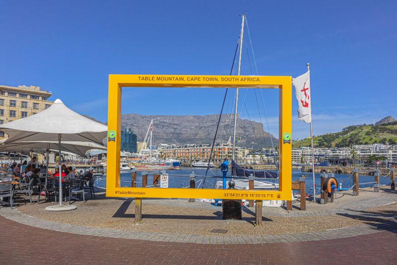 The bustling Victoria and Alfred Waterfront with the Table Bay Harbour.