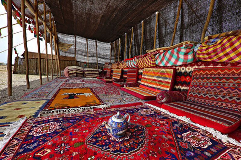 Nomadic Qashqai tent with carpets and rugs on sale in Iran