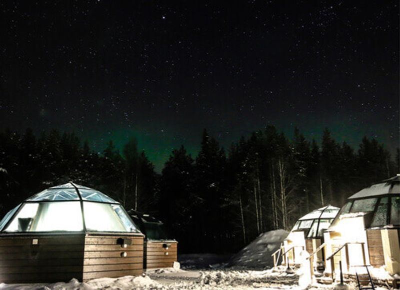 Stargazing at the Arctic Snow Hotel in Sinetta, Finland.