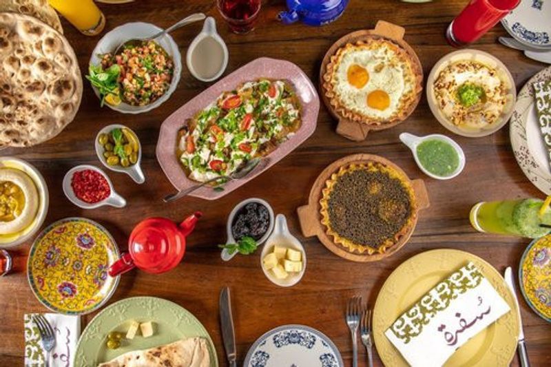 A variety of local dishes laid out on a table.