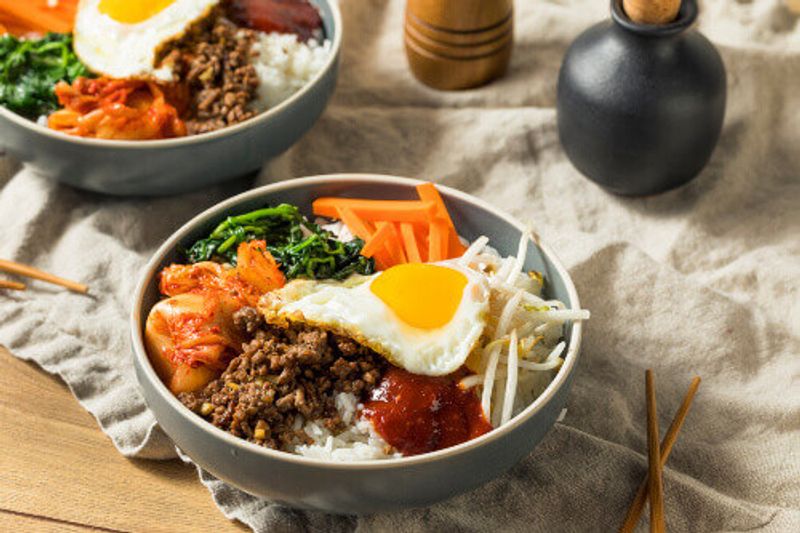 Korean spicy Bibimbap, with rice with egg and beef.