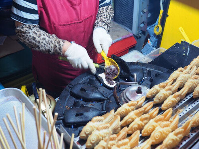 Korean style pancake or Bungeoppang is a fish shaped bread with a sweet red bean filling.