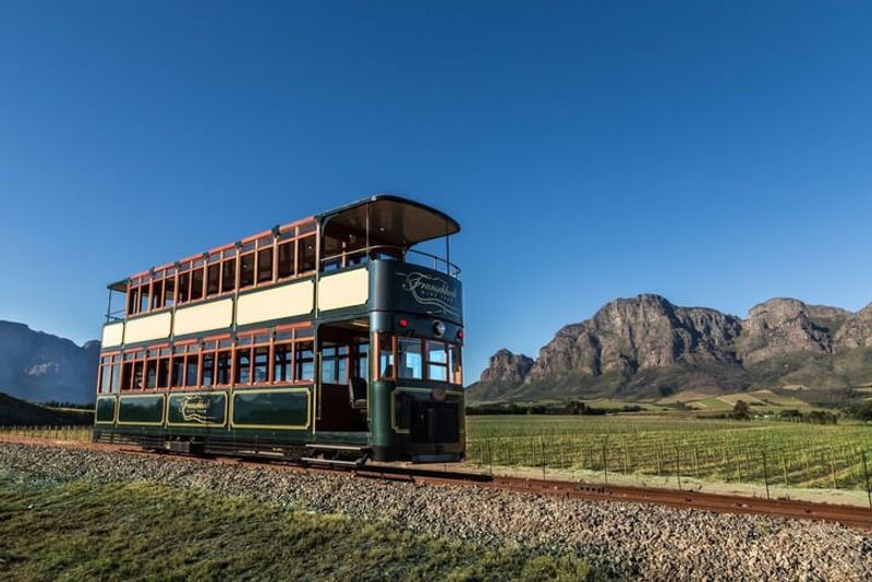 Visitors to the wineries enjoy a trip on the Franschhoek Wine Tram.