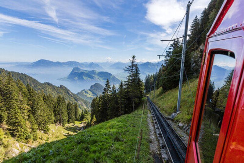 The Pilatus train, the worlds steepest cogwheel railway nears the top of Mount Pilatus in Lucerne, Switzerland.