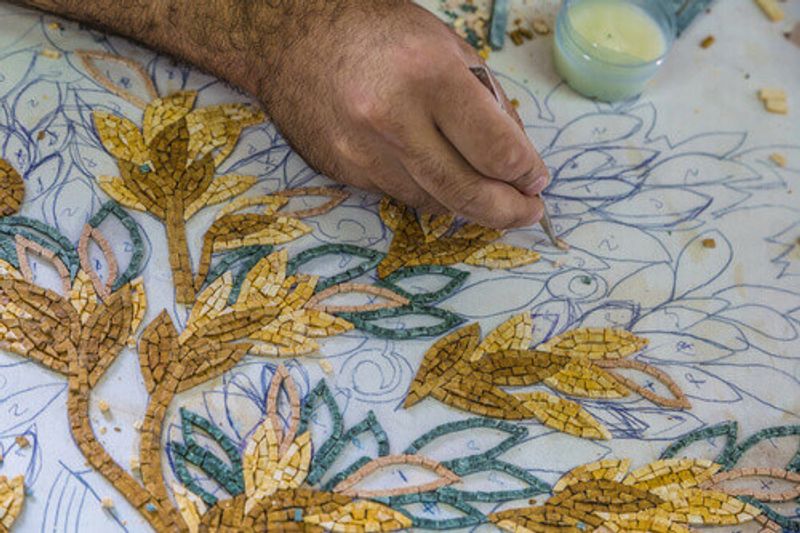 Artisans make intricate mosaics in Madaba, Jordan.
