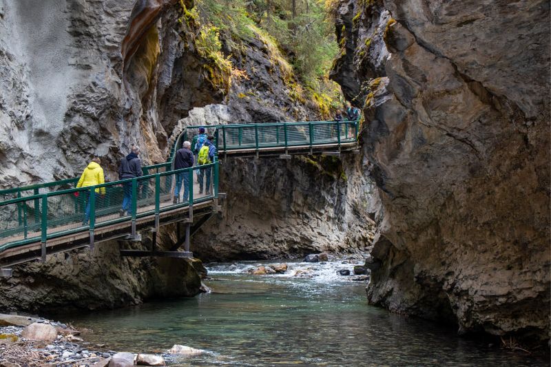 Lake Louise Tourism presents the Johnston Canyon Lower Falls as a must-see aspect of Banff.