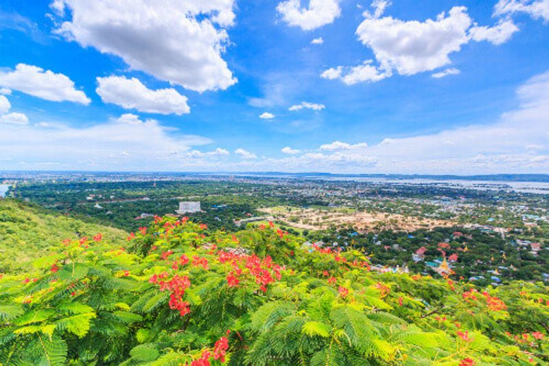 The panoramic view of Mandalay from the top of Mandalay Hill, a major tourist attraction.