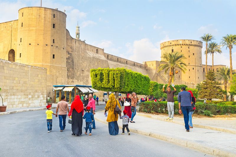 A family visiting the Saladin Citadel which boasts a garden for kids and family