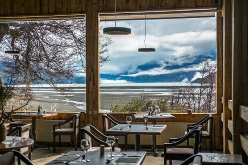A hotel restaurant with the view of Lake Grey in Torres del Paine National Park, Chile.