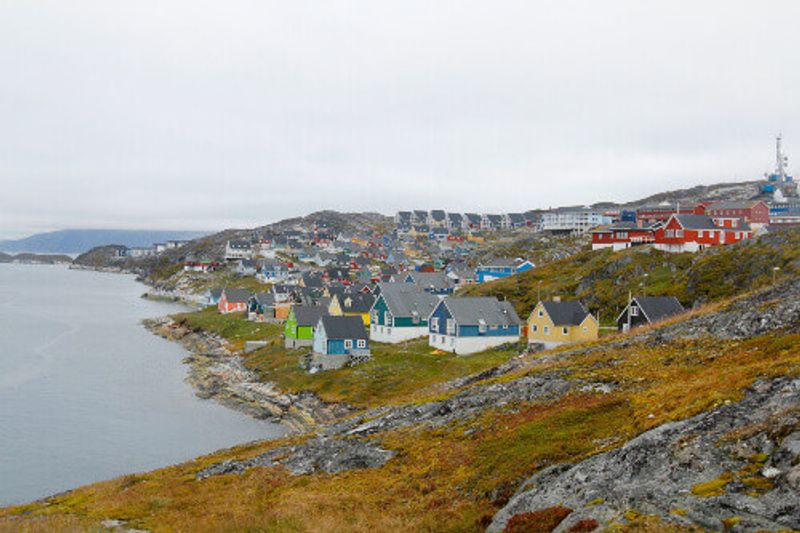 Grey skies and colourful houses in Nuuk.