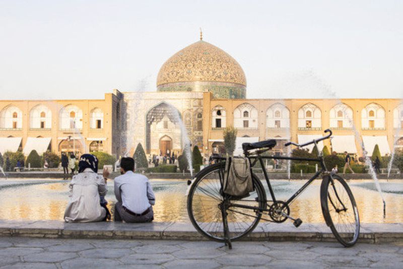 Locals and visitors looking at the Isfahan.