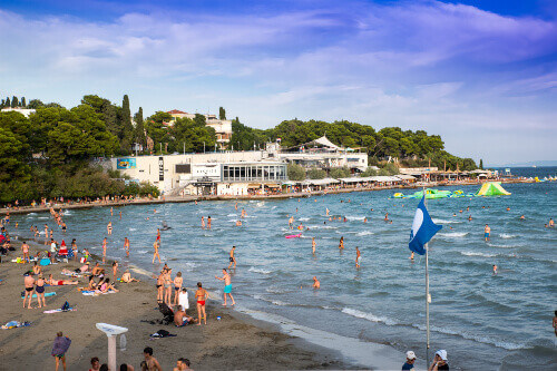 The famous Bacvice Beach, packed with locals and visitors.