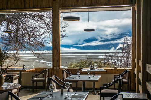 A hotel restaurant with the view of Lake Grey in Torres del Paine National Park, Chile.